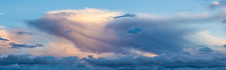 clouds in the sky making shapes, figures and drawings of various colours