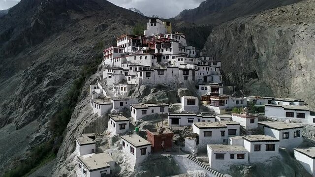 aerial perspective, front facing view of an isolated, ancient buddhist monastery. nubra valley, ladakh, india