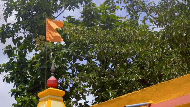 hindu flag on temple om orange maharashtra india marathi.