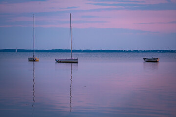 boats on the lake at dawn