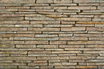 Texture of brick wall and concrete blocks. Samples of stone plates stacked evenly in a row.