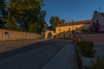 Gmund castle and buildings in summer orange morning
