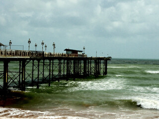 SEASCAPE WITH RAIN CLOUDS AND PIER 