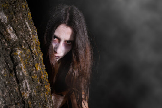 Scary ghost woman, halloween theme. Dark, fear. High quality photo
