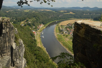 Obraz premium The stunning cliffs and riverside in the Saxon Bohemian Switzerland in Germany