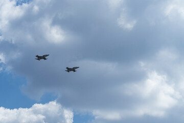 Daylight. combat vehicle aircraft in the amount of two pieces. blue sky.