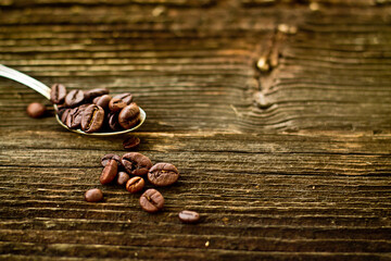 morning drink,coffee beans,coffee beans on a wooden background.