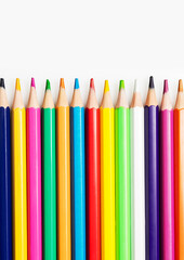 Fototapeta premium Close up of color pencils on white background.