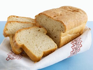 loaf and slices of tasty homemade bread 