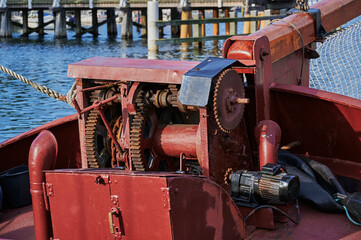 Details of a historic sailing boat anchored in the port of the hanseatic city of Greifswald in Germany.