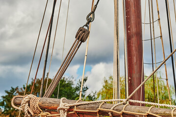 Details of a historic sailing boat anchored in the port of the hanseatic city of Greifswald in...