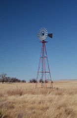 Abandoned homestead and windmill