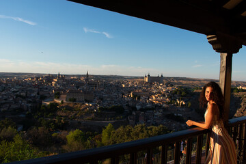 A girl in a viewpoint of Toledo