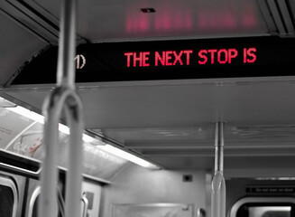 New York Subway Sign Announcing the Next Stop on Digital Screen