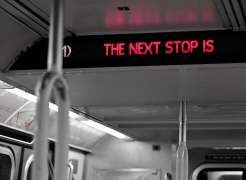 New York Subway Sign Announcing The Next Stop On Digital Screen