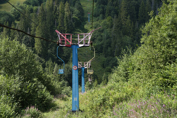 supports of a mountain lift in a landscape