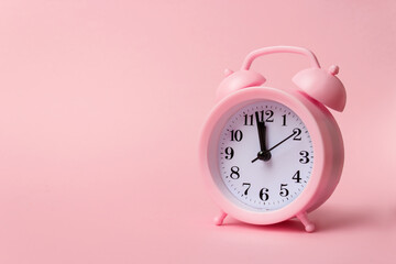 Pink alarm clock. Time is money mockup. Time-limit. Business deadline. Copy space.