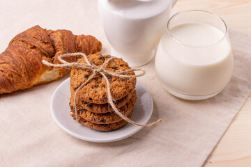 homemade oatmeal cookies on rustic background