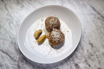 Ketogenic snack with peanut candy and Brazil nuts