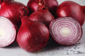 Some red onions on the table	