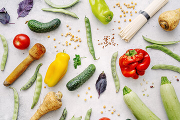 Appetizing organic vegetables on light background