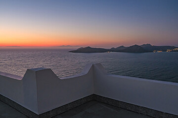 Beautiful Sea View from white terrace balcony of house or hotel at sunset