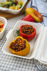 Sat of take away boxes with healthy food on the table. Restaurant dishes. stuffed pepper
