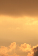 orange sunset sky with clouds