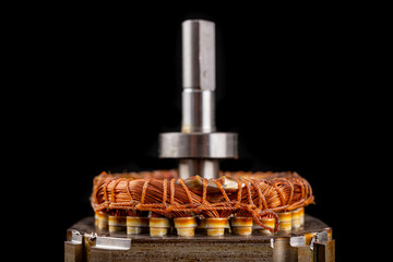 Copper winding of the electric motor. Spare parts for the repair of electrical appliances.