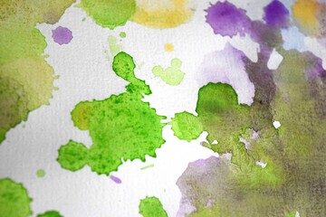 green, purple and beige watercolor background