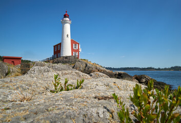 Fototapeta na wymiar Fisgard Lighthouse Victoria Canada. Historic Fisgard Lighthouse located near Victoria, British Columbia overlooking the Strait of Juan de Fuca.