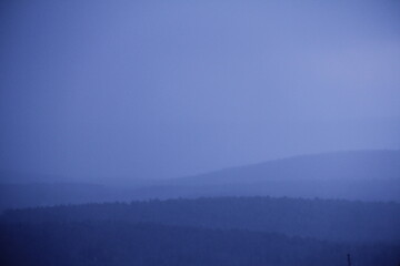 blue mountain horizon landscape trees dusk mist