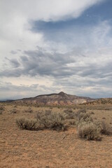 Naklejka premium Abiquiu New Mexico desert desert rocks landscape Mountain sky