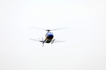 Agricultural helicopters fly in the sky