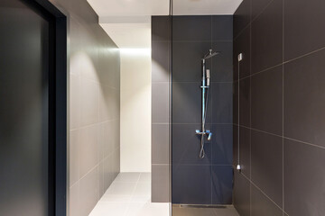 Interior of a hotel bathroom interior with shower cabin