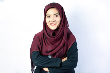 Muslim woman standing on white background