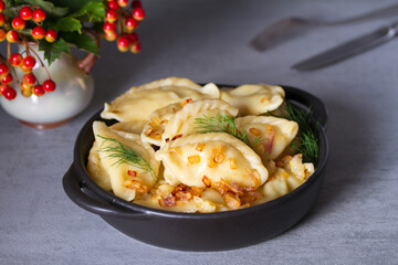 Dumplings, filled with potato. Varenyky, vareniki, pierogi, pyrohy - dumplings with filling