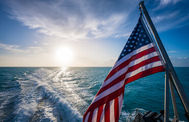 American Flag and Sunrise Over Gulf of Mexico