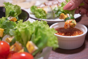 Colorful and healthy salad roll with fresh tomato