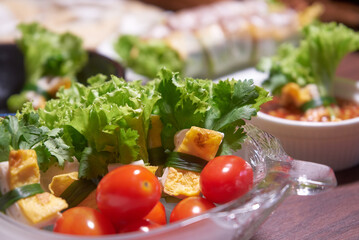 Colorful and healthy salad roll with fresh tomato