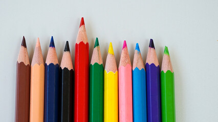 colored pencils on white background