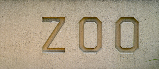 Stone zoo sign at Park Entrance