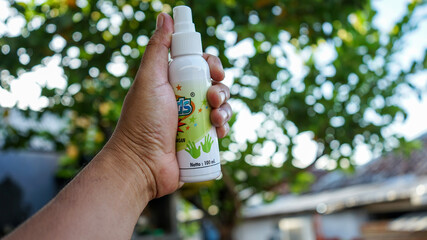 woman holding a christmas tree