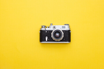 retro camera on yellow background