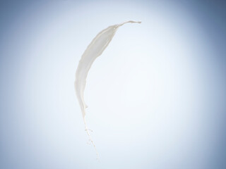 Image of coffee and milk flying in the air