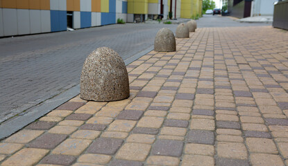 Stone pillars restrictive for the safety of pedestrians on the street