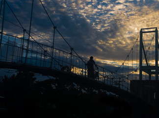 Early morning sunrise through an over bridge 