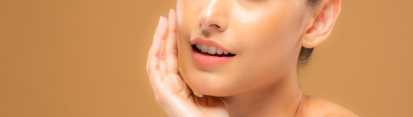 Beautiful woman with good skin taking pictures of face with hands, beautiful portrait and spa. Happy smiling face