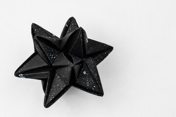 Small stellated dodecahedron with white background - obrazy, fototapety, plakaty