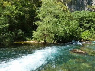 Magnificent landscape of Provence where the Sorgue river flows in a beautiful natural environment at Fontaine de Vaucluse